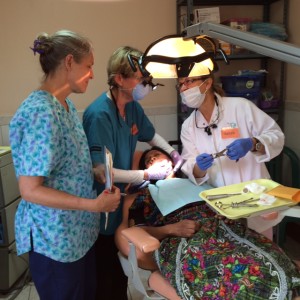 Dr. Norling & team members with a patient